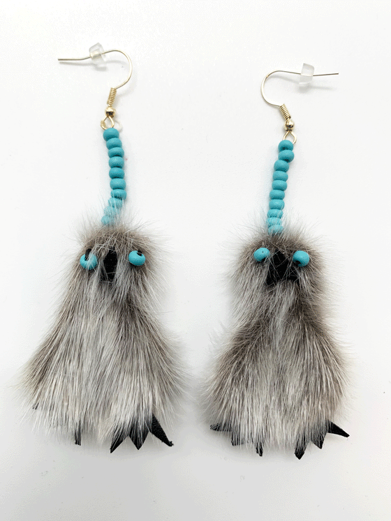 Sealskin owl-shaped drop earrings with turquoise beads for eyes.