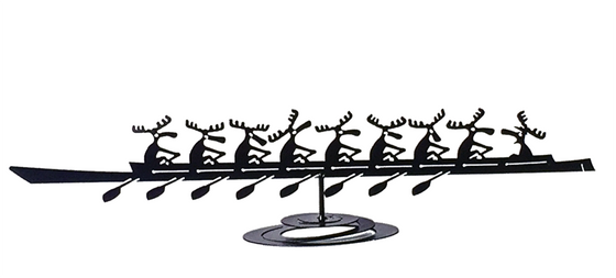 A team of rowing moose pull in their sleek racing boat in this black silhouette standing piece. The unique coiled base allows the boat to rock back and forth, making the moose seem like they are bobbing on the water.