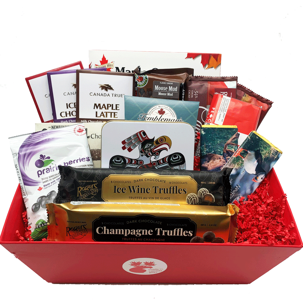 This large sized chocolate gift basket features tasty chocolate products all made in Canada. Products include various chocolate bars, truffles, fudge, maple caramel chocolates, chocolate berries, and a First Nations art tin filled with assorted chocolates. 