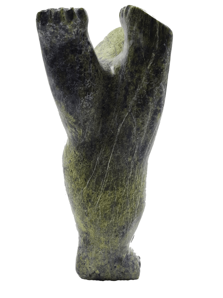 A dancing bear carved from brilliant green soapstone. The bear dances on one hind foot, with the other raised and its paws thrown up in front of it. The bear throws back its head in jubilation. This bear faces the viewer.