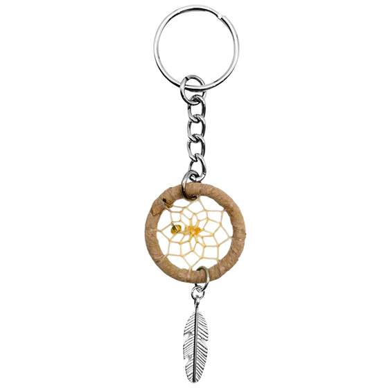 A tan dream catcher keychain with beige beads and a metal feather attached to a keyring.