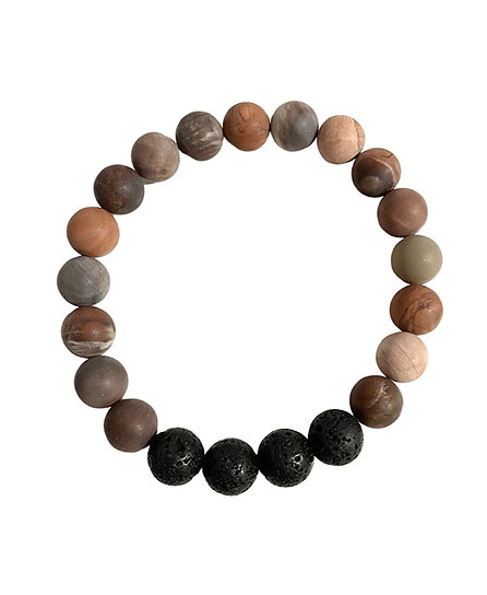 Our Canadian made aromatherapy "Grounded" bracelet is made out of 10mm petrified wood and lava beads, which  is a grounding stone, perfect when wanting to increase patience and balance in your life.