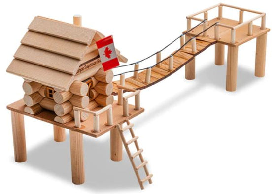 A small log cabin on stilts connects to an elevated observation deck via suspension bridge. The cabin is made of interlocking logs and features a traditional Z-panel door, chimney, and Canadian flag above the door.
