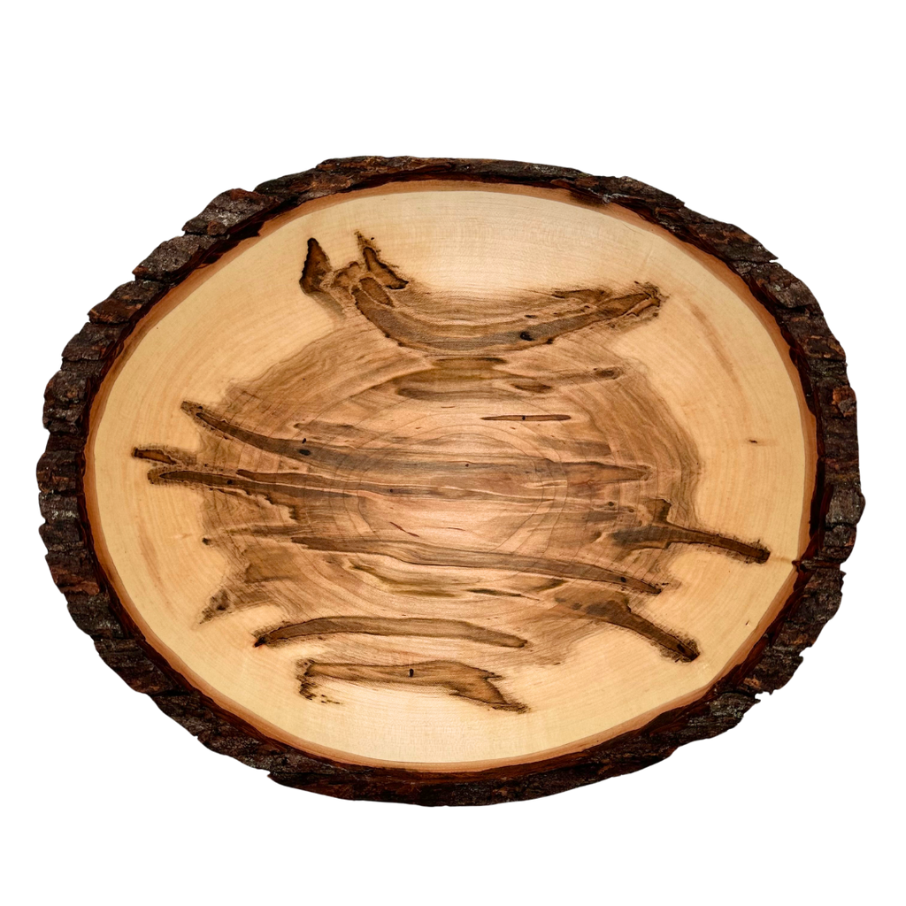 A top view of a bowl carved from a single piece of ambrosia maple. The bowl is raw edged, and shows the original dark brown bark from the tree. The base of the bowl prominently shows the signature grey-brown streaks left by passing ambrosia beetles.