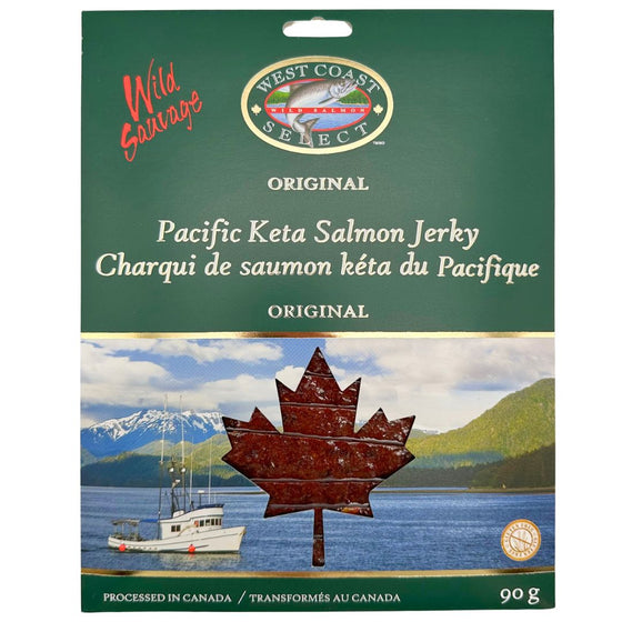 A pack of salmon jerky. On the front is a picture of a boat on water with mountains in the back. The top is a forest green colour with product name. The center has a maple leaf cut out where you can see the jerky inside.