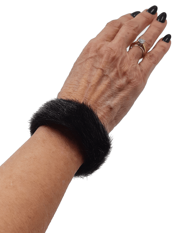 Black sealskin bracelet on model. 