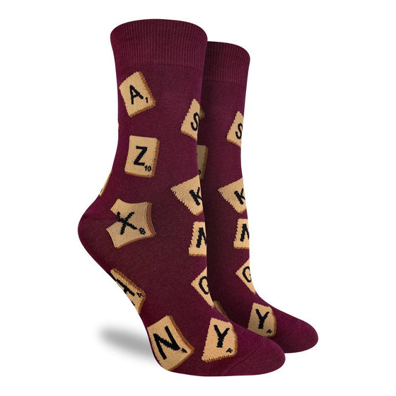 These maroon coloured socks are ready to bestow linguistic excellence on whoever wears them. Featuring several letter tiles, these socks are perfect for scrabble lovers. 85% Cotton, 10% Polyester, 5% Spandex