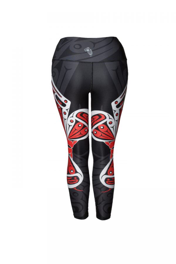 The butterfly leggings viewed from behind. The bottom wings of the butterflies can be seen.