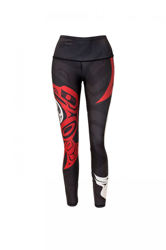 These black, red and white leggings are decorated with a Haida eagle and raven, juxtaposed as ying and yang, though they are hard to see in this photo. The front of a red raven can be seen here on the right leg.