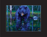 A print with a black border depicting a blue and black coloured bear in blue and green murky swamp water. The water shows the reflection of the bear and surrounding rocks and trees. Green grass and forest trees are behind the bear.
