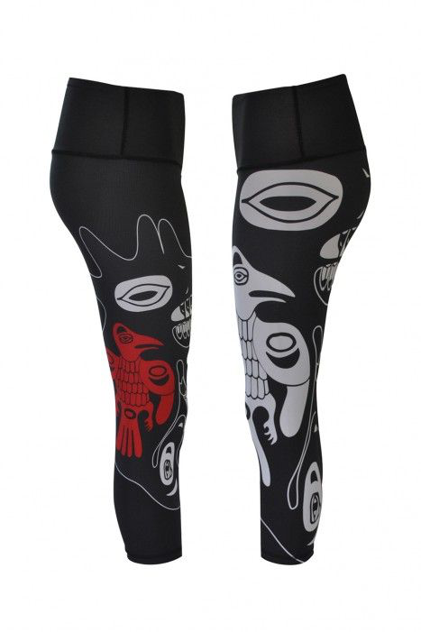 The right and left view of the raven leggings. The right leg clearly shows the small red ravee as well as the large eye of the unknown creature. The left leg shows the large white raven.