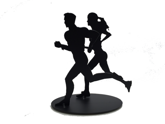 This metal sculpture shows the matte black silhouette of one male and one female figure running together. The female runner is slightly behind and to the right of the male. Both have one foot planted on the ground with the other in the air behind them. Both are pumping their arms as they run. The piece stands on a small oval base.