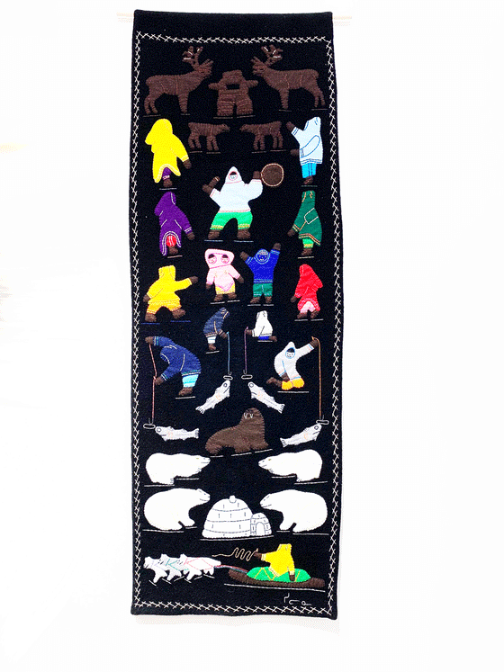 This stunning duffle wall hanging was created by Inuk artist Celina Lootna in Arviat Nunavut and features many aspects of Inuit life and its culture in vivid colours against a black background