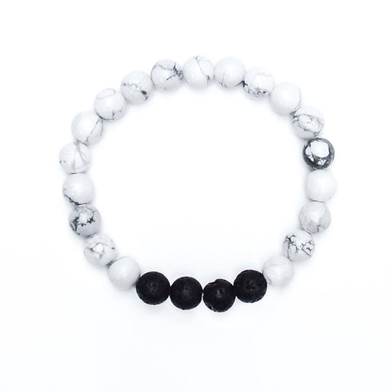 Our Canadian made aromatherapy "Chill" bracelet is made out of 8mm White Howlite and lava beads, which is a stone of patience, peace and calming.