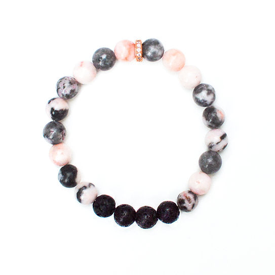 Our Canadian made aromatherapy "Gratitude" bracelet is made out of 8mm Zebra Jasper and lava beads, which holds the energy of gratitude and optimism
