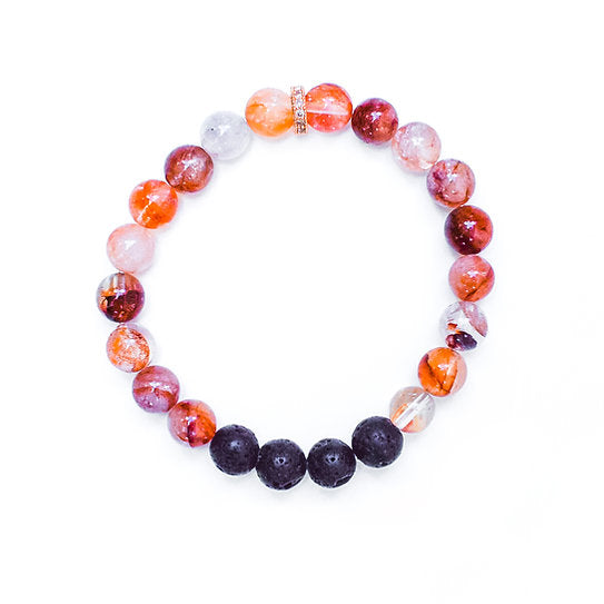 Our Canadian made aromatherapy "Uplift" bracelet is made out of 8mm red iron quartz and lava beads, which has the energy of strength, vitality and joy creating feelings of true happiness while transforming negative energy to positive.