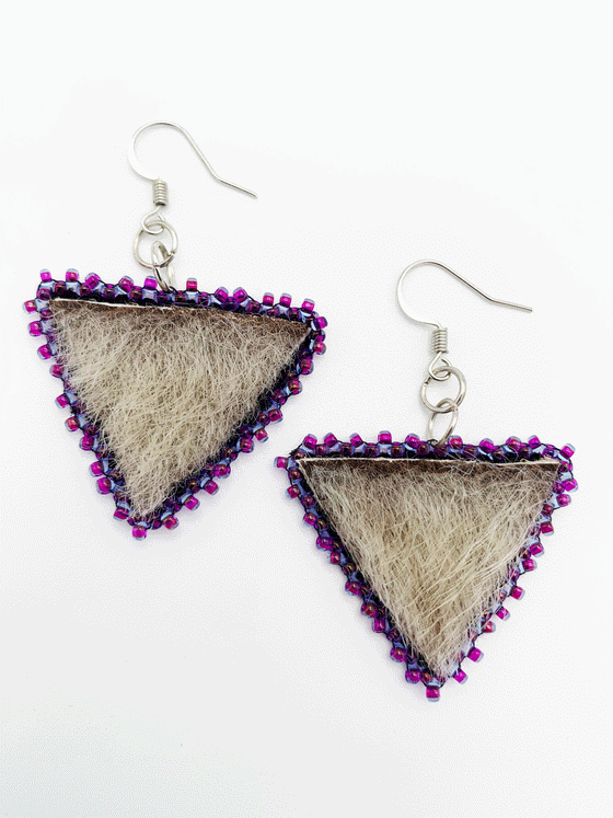 grey seal skin, triangle drop earrings with purple beads bordering the sealskin.