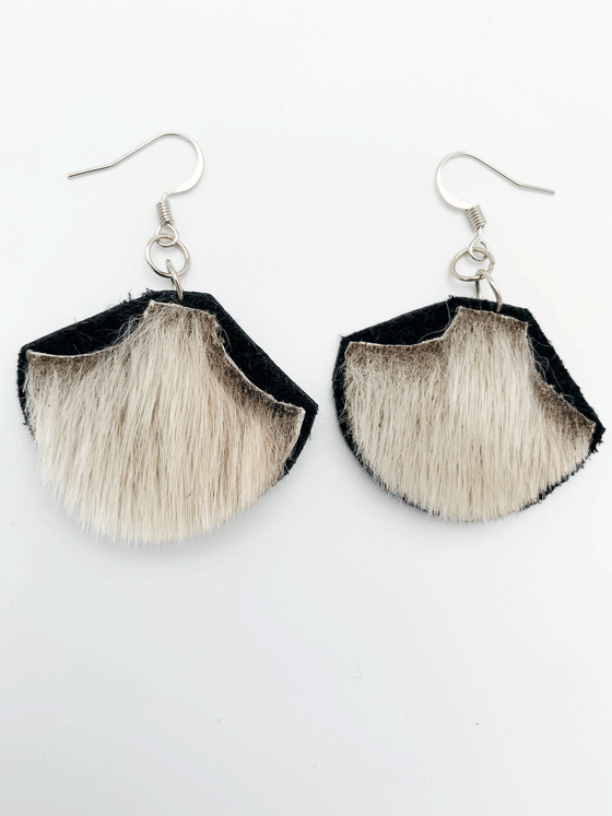 grey seal skin, shaped like an Inuit ulu, drop earrings.