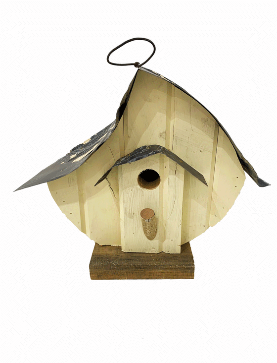 Beautiful handcrafted wooden bird house with a steel roof and vibrantly painted walls.
