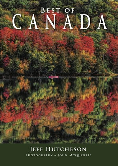 Best of Canada book with reflection of trees on a lake by author Jeff Hutcheson and photographed by John McQuarrie