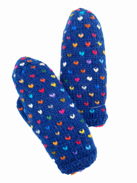 An indigo pair of knit mittens with small colourful hearts. Colours consist of red, white, blue, yellow, orange, purple and pink.