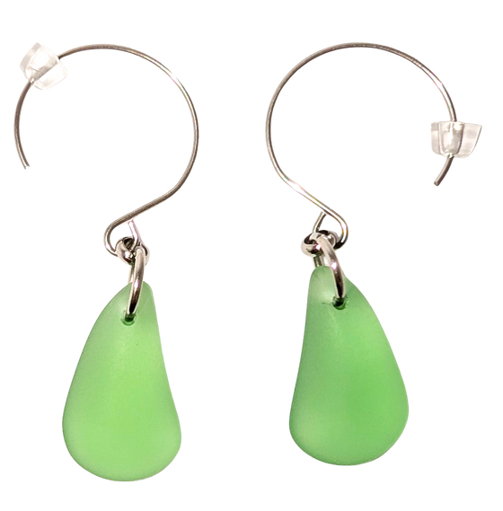 Green teardrop sea glass earrings with silver hooks.