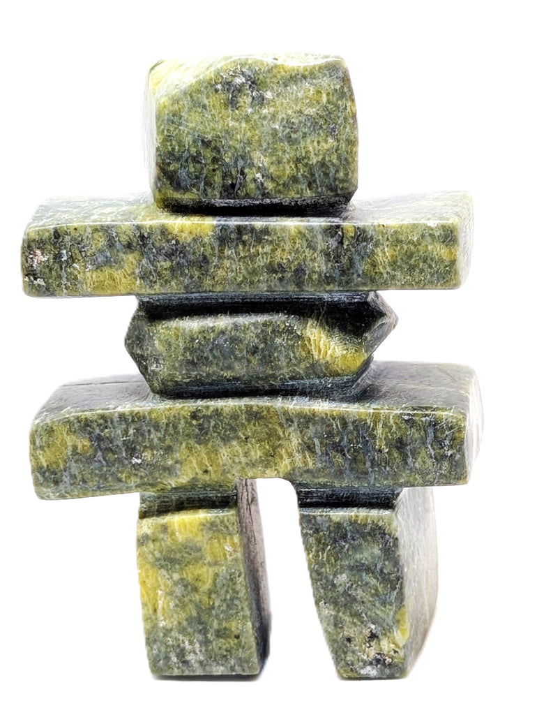 A green marbled inukshuk soapstone carving.