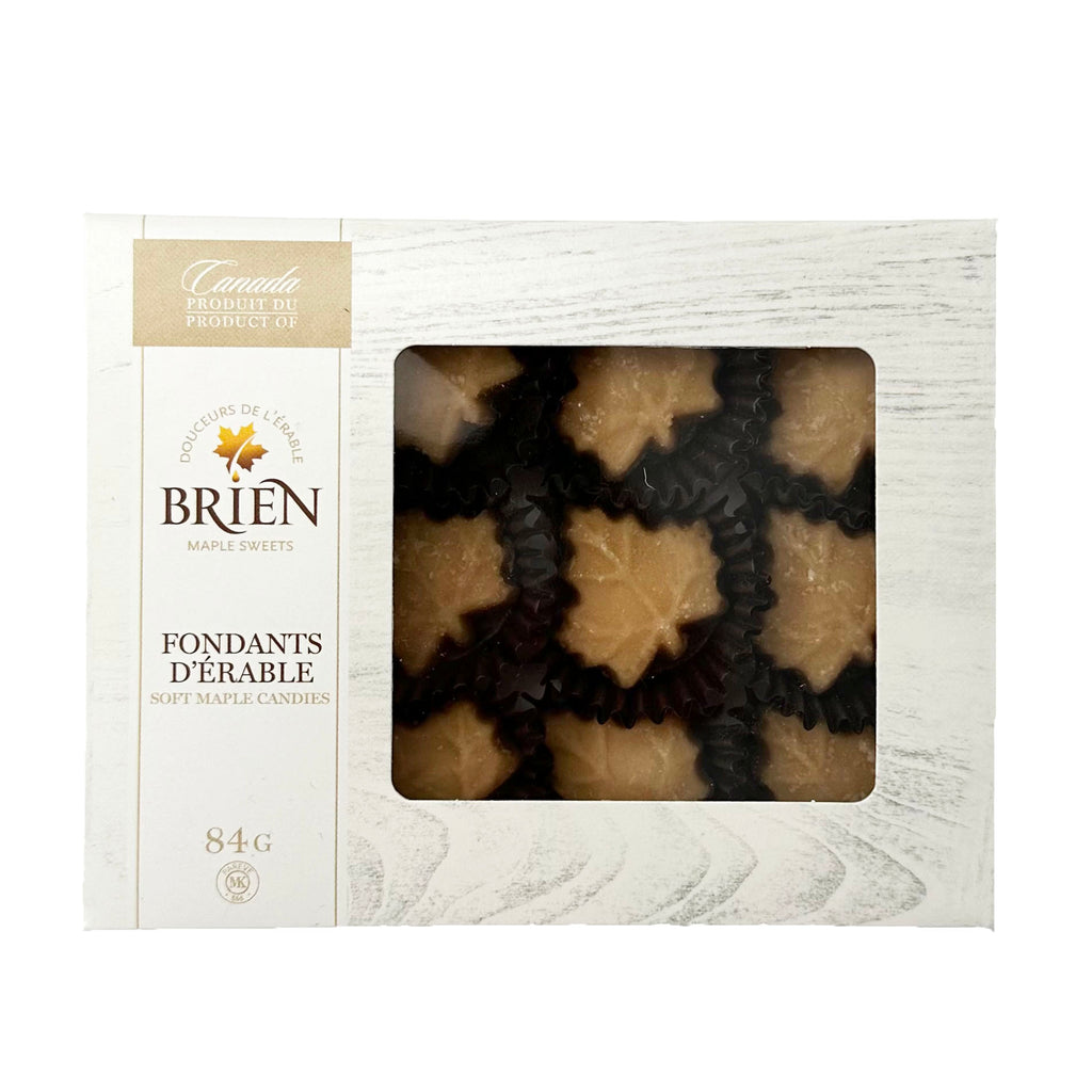 White box with clear window through which the maple leaf-shaped fondant candies are visible.