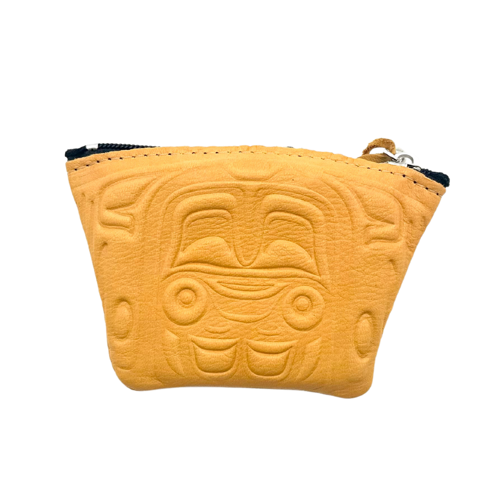 This stunning vibrant yellow coin purse made of soft handmade deerskin features a beautiful embossing of a First Nations bear