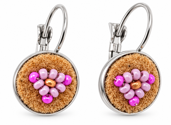A pair of silver leverback earrings with round brown moose hide facepalm charms featuring pink and bronze beaded flower details, shown on a white background.
