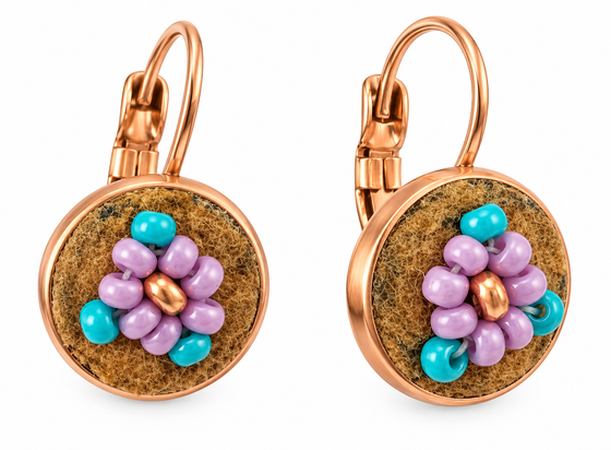 A pair of bronze leverback earrings with round brown moose hide facepalm charms featuring blue and purple beaded flower details, shown on a white background.
