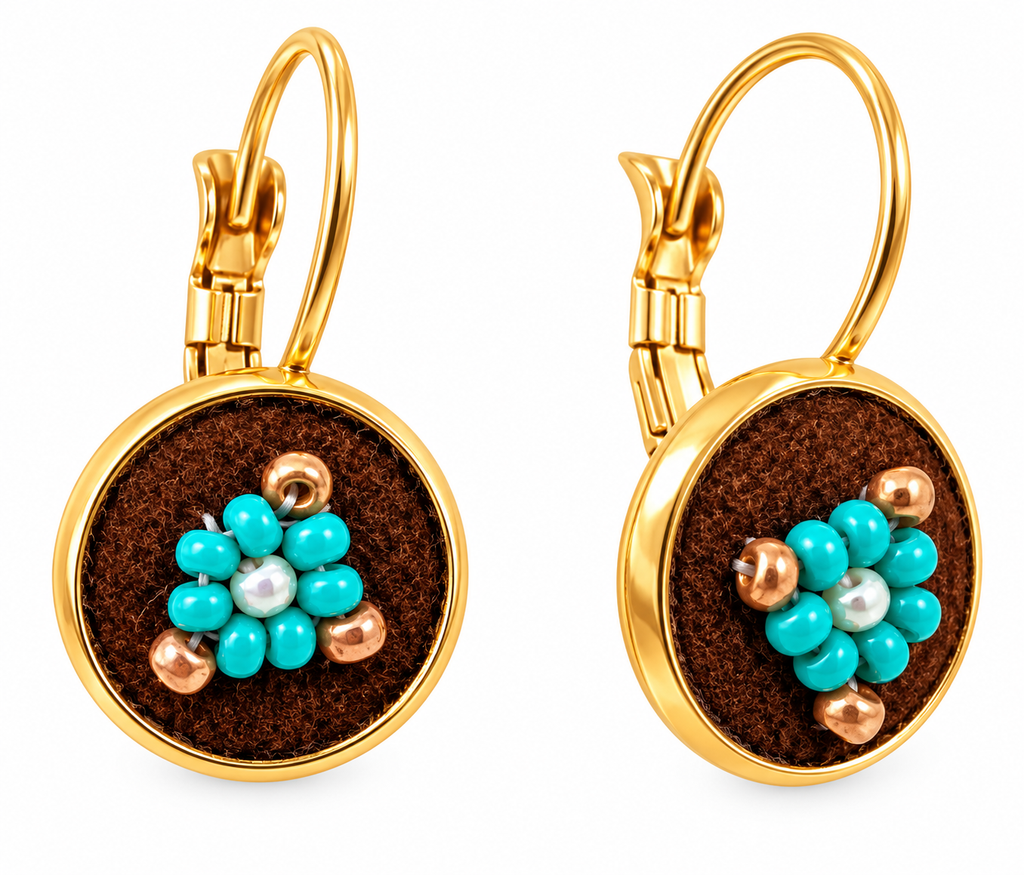 A pair of gold leverback earrings with round brown textured facepalm charms featuring blue and bronze beaded flower details, shown on a white background.