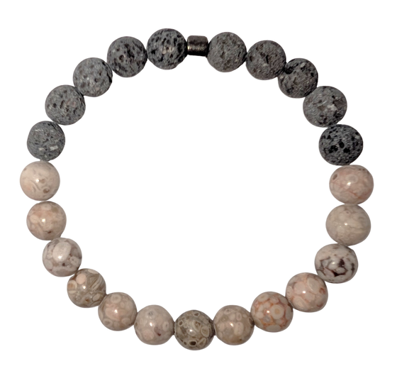 Bracelet with one half of light beige maifan stone beads and the other with black lava beads.
