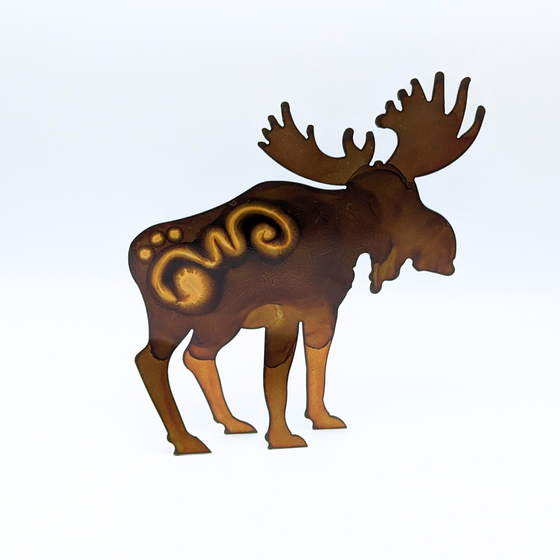 a hand painted brown metal moose with abstract waves painted on its back.