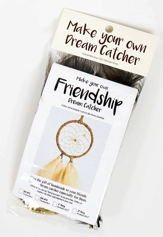 A kit contains all the tools and instructions to make a stylish 3-inch dreamcatcher. The dreamcatcher depicted here uses tan leather and feathers.