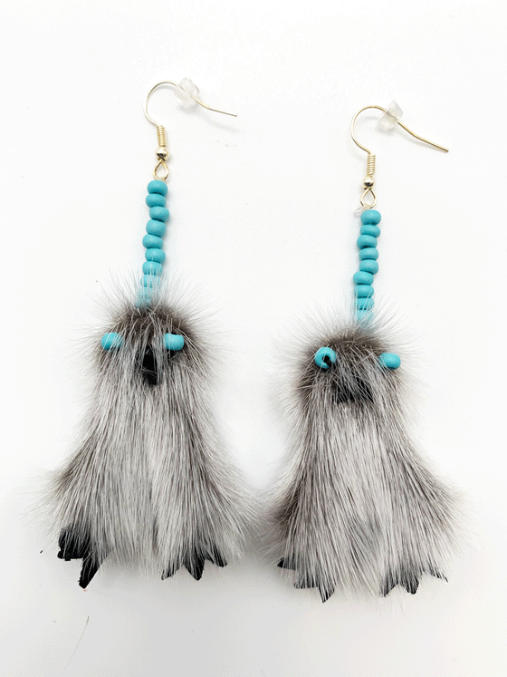 Sealskin owl-shaped drop earrings with turquoise beads for eyes. 