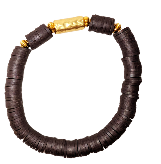 Bracelet with dark brown disc beads and gold accent beads.