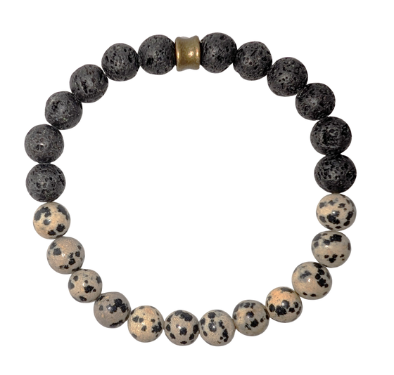Bracelet with one half of spotted light beige and black dalmatian jasper beads and the other with black lava beads.