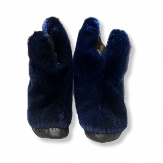 Fluffy blue sealskin mittens. The outside of the mittens have sealskin fur and the palms of the mittens are a sealskin leather material.