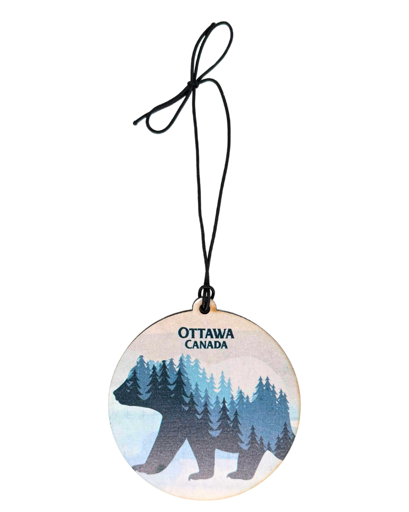 Round wooden ornament with a blue bear design and 'Ottawa Canada' text.