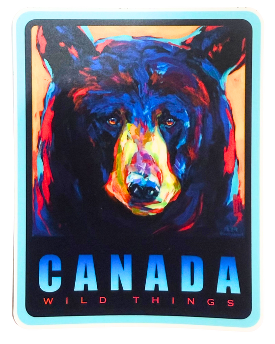 Colorful bear face sticker with 'Canada Wild Things' text with a light blue border.