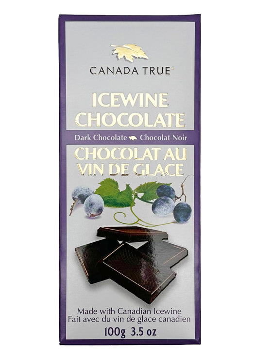 White box with a purple outline. Product name is in center of box, embossed, and in gold. Image of the chocolate and ice wine berries with vines.