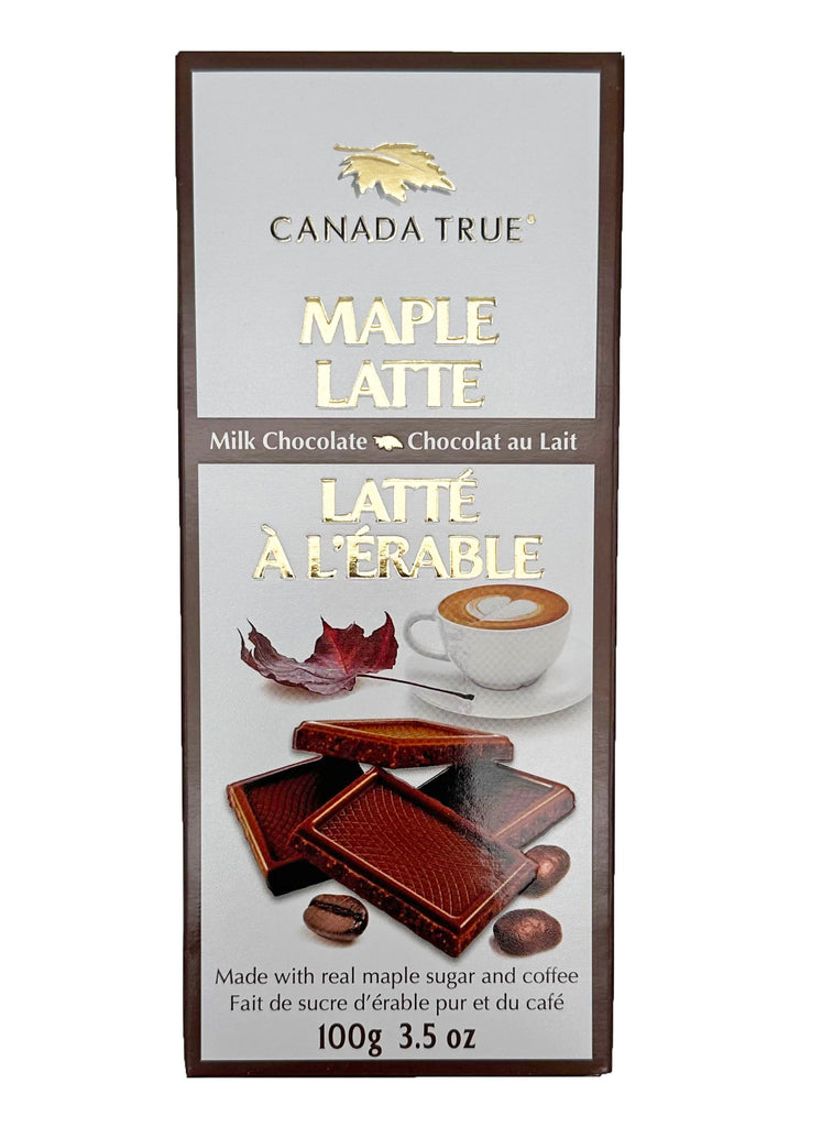 White box with a brown outline. Product name is in center of box, embossed, and in gold . Image of the chocolate, a maple leaf, and a latte.