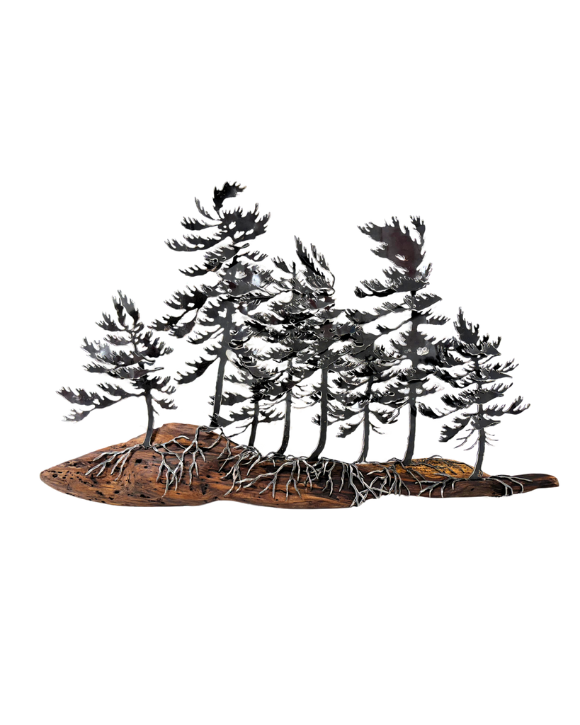 Metal sculpture of 8 trees on a long piece of wood.