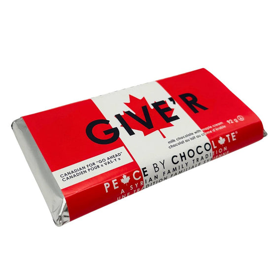 Silver foil wrapped chocolate bar. In a sleeve with a Canadian flag background with black lettering that says "Giver'r." Smaller text in bottom left corner says "Canadian for 'go ahead'."