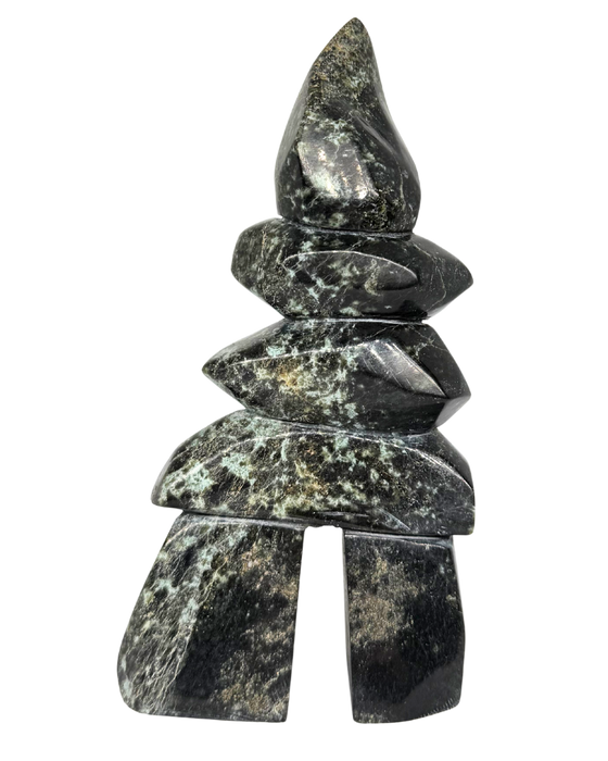 Black and slightly green marblesque patterned inukshuk.
