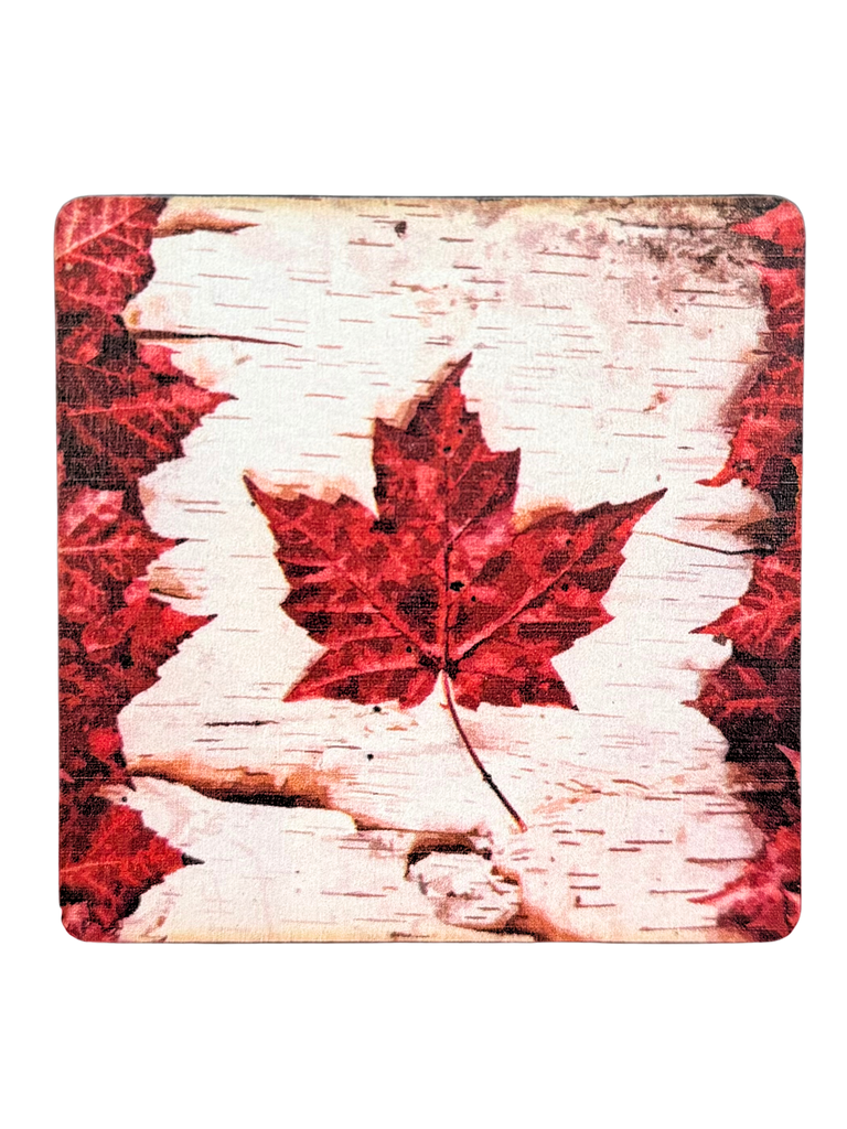 Magnet with the Canadian flag made out of maple leaves. The white part of the flag resembles a birch tree pattern.