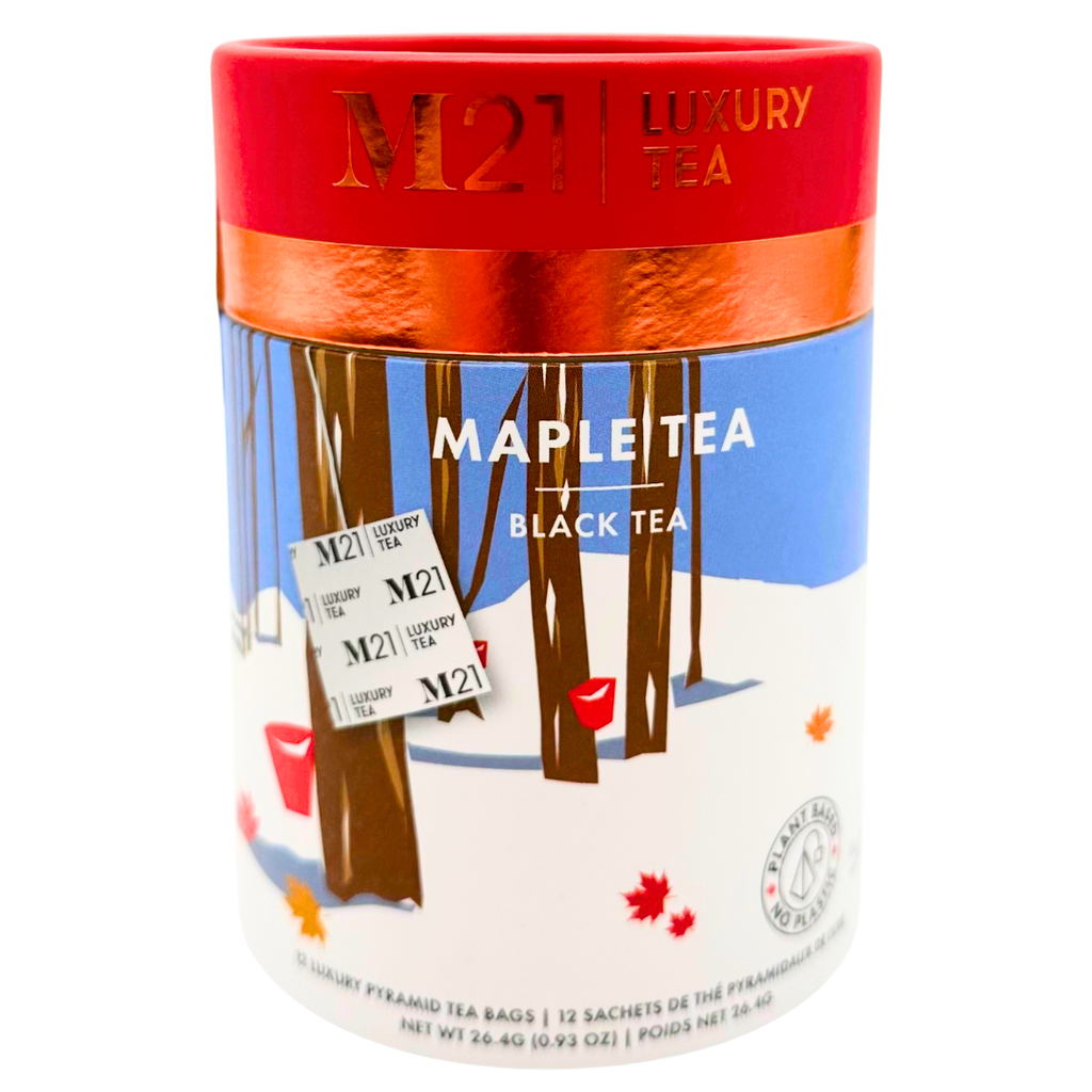 A cylindrical box that holds twelve maple flavoured tea bags. The tea bags are pyramid shaped and are blended and packed in Canada. The container is made from 100% recycled paper. The illustration on the canister depicts a Canadian winter forest scene with maple trees. Red buckets hang from the trees representing the maple syrup harvest and maple leaves scatter the ground.  The red imagery matches the red coloured lid. It includes instructions to brew for three to five minutes. 