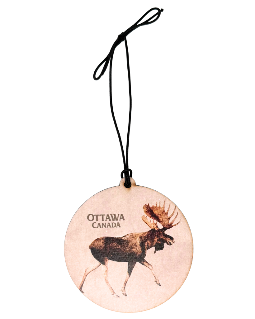 Round wooden ornament with a moose design and 'Ottawa, Canada' text.