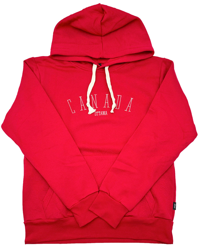 Red hoodie with white drawstrings. In the middle is stitched "Canada" with a slight curve. Underneath is stitched "Ottawa" in smaller letters.